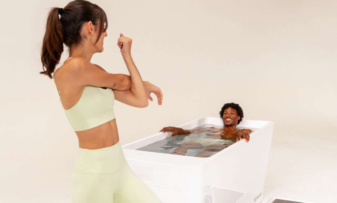 Woman staring at a man in a plunge tub